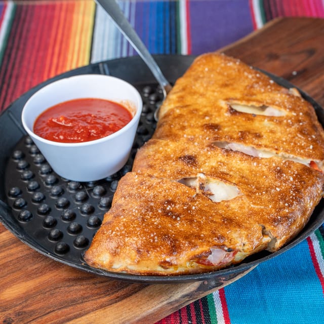 Triple Cheese Calzone.